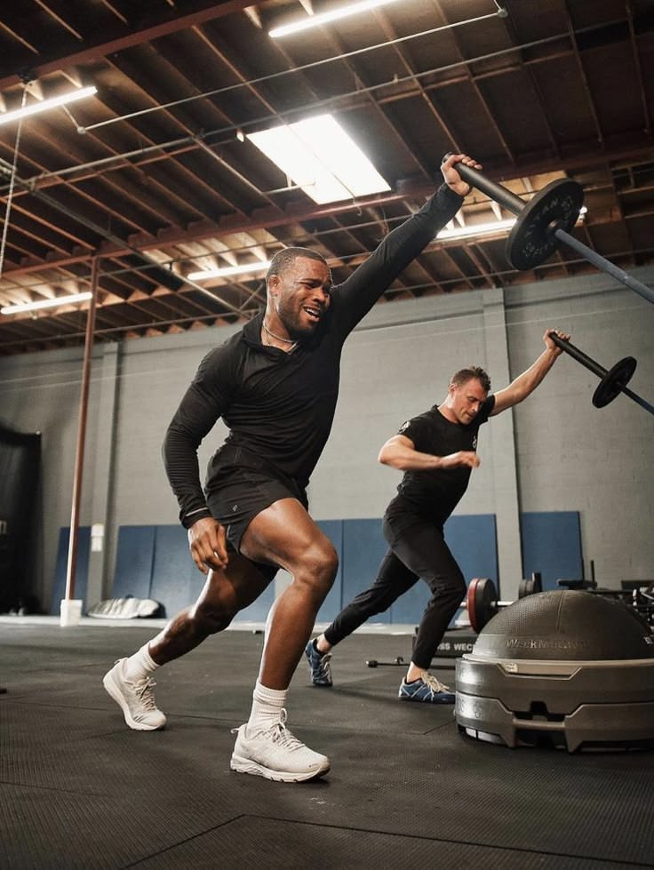 Two men exercising in a gym